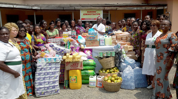Mr Emmanuel Pappoe receiving the items from Ms Comfort Ofori Angmor, the President of the NVTI Ladies Club Mr Emmanuel Pappoe receiving the items from Ms Comfort Ofori Angmor, the President of the NVTI Ladies Club
